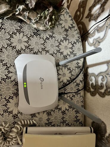 gpon modem qiymeti: Tiplink router satilir ideal veziyyetdedir yenisi alinib deye satilir