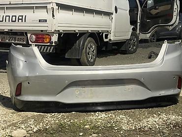 Задний бампер для Hyundai (седан), серебристый цвет. - Оригинальная