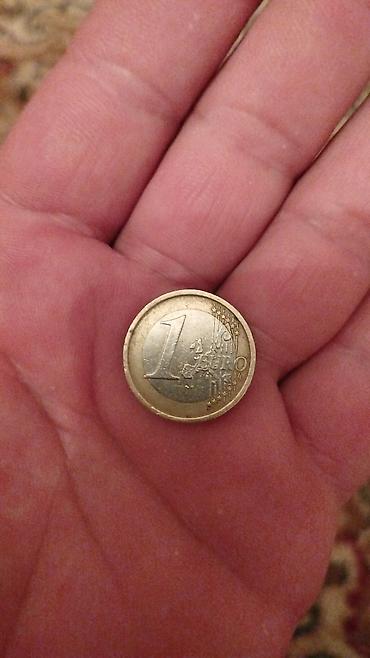 Монеты: Məhsul: 1 avro sikkəsi – İtaliya versiyası Təsvir: - Nominal: 1 EUR - — 1