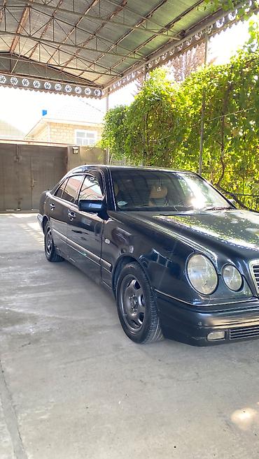 mator 80cc vəlo: Mercedes-Benz E 230: 2.3 l | 1996 il Sedan — 3
