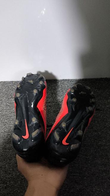 бутсы фантомы: Футбольные бутсы Nike Phantom GT (шнуровка сбоку) для игры на — 1