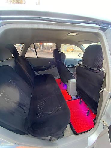 передвижные дома: Mazda Familia: 2001 г., Бензин, Хэтчбэк — 6