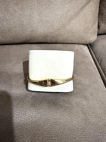 Digər qadın geyimləri: Qızılı rəngdə metal qolbaq - Material: parlaq qızılı tonlu metal — 3