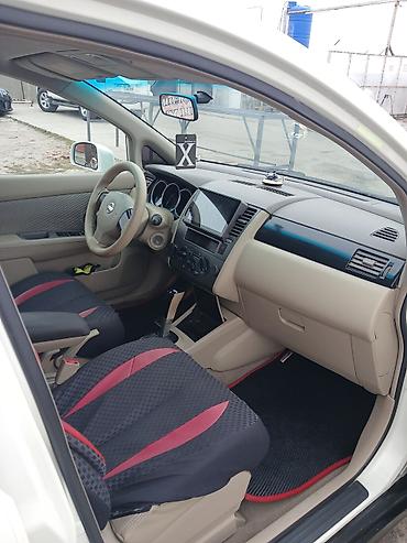 4 ayaq: Nissan Tiida: 1.6 l | 2006 il Sedan — 5