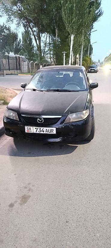 велоприцеп для детей: Mazda 323: 2002 г., Механика, Дизель, Хэтчбэк — 3
