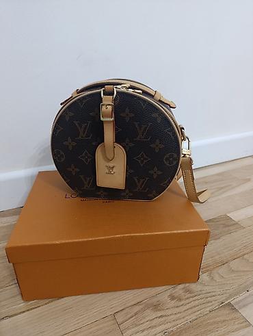 louis vuitton: Сумка Louis Vuitton Tambourine Monogram Canvas - Форма: круглая — 1