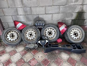 Автозапчасти для Honda (см. фото комплектом): - 4 стальных диска с