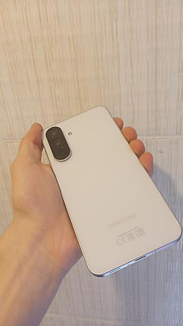 sim operator: Samsung Galaxy A56, 256 GB, rəng - Ağ, İki sim kartlı, Barmaq izi, Face ID — 9