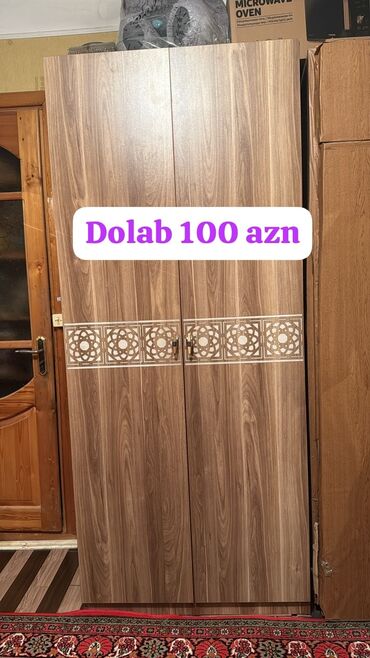 Giriş qapıları: Dolab eni 90 uzunu 2.10 icerisi yalniz polkalidir asilqan yoxdur 100