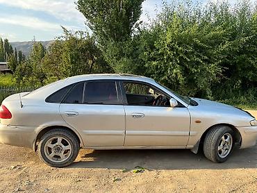 карбиратор 2106: Mazda 626: 2001 г., 2 л, Механика, Бензин, Хэтчбэк — 4