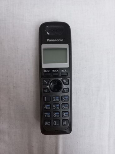 Другие мобильные телефоны: Домашний телефон Panasonic. Характеристики: наличие автоответчика