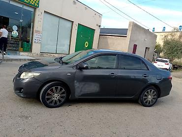 corolla 1.4 dizel: Toyota Corolla sedan - Kuzov: 4 qapılı sedan, tünd boz rəng - — 4