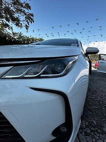 Toyota Corolla: 2019 г., 1.8 л, Автомат, Гибрид, Седан