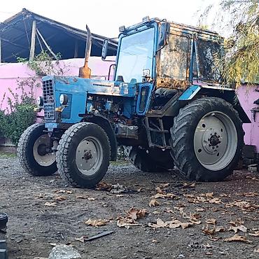 kia rio farasi: Mavi rəngli kabinəli təkərli traktor - Güclü dizel mühərrik, mexaniki — 1