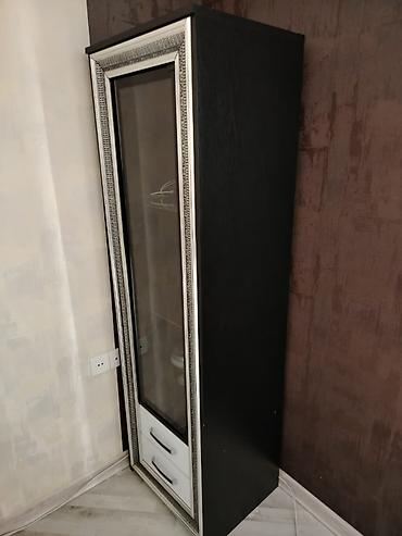 Şüşəli dolab vitrini, İşlənmiş, Ünvandan götürmə