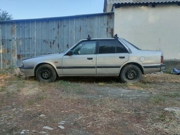 авто обмен на дом: Mazda 626: 1985 г., 2 л, Механика, Бензин