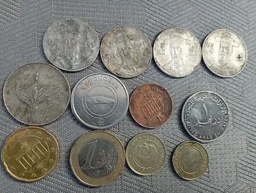 Монеты: Набор жетонов и монет: - 2 жетона «Евромойка» для автомойки — 19