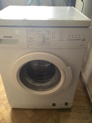 erikson 1018: Siemens E 10-18 modelinin ağ rəngli, ön yükləməli paltaryuyanı. Bu — 3