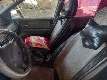 Другие автомобили: Просторный минивэн белого цвета с рейлингами на крыше — 2