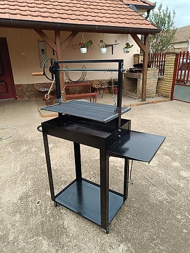 Sve za roštilj: Podesivi roštilj u dimenziji rešetke 65x45 cm Rešetka je izrađena od — 5