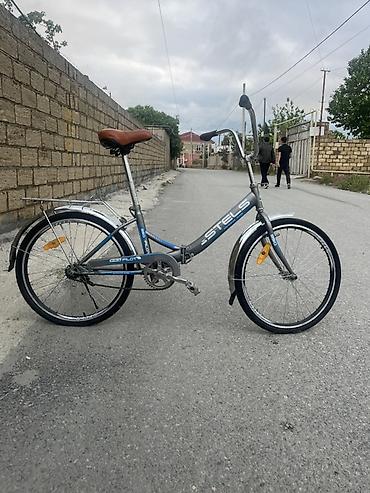 24 velosipedler: 24 lük. Təzədir qatlanır baglanır az isidifade olunub sumqayıt. )) — 1