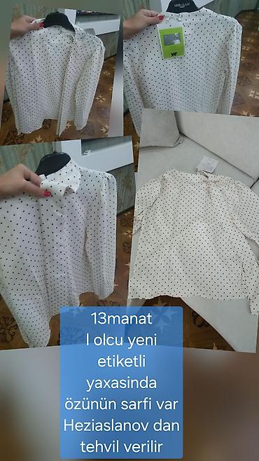 Ağ rəngli, qara xallı qadın köynəyi/bluz. Zərif və klassik görünüşə — 1