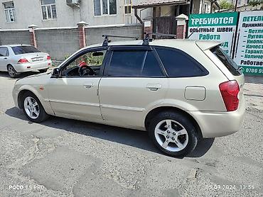 шторка фит: Mazda 323: 2003 г., 1.6 л, Механика, Бензин, Универсал — 5