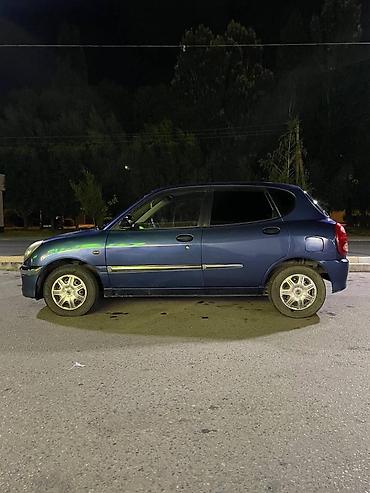 Toyota: Toyota Дуэт: 2003 г., 0.9 л, Автомат, Бензин, Хэтчбэк — 12