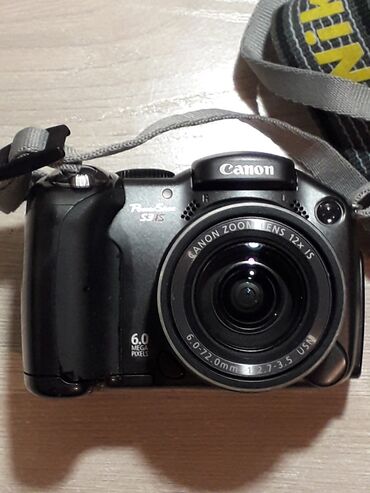 ремень для фото: Canon SX3is, все работает, но крышка для батареек плохо держит