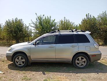 жондер прес: Mitsubishi Outlander: 2002 г., 2.4 л, Автомат, Бензин, Кроссовер — 1
