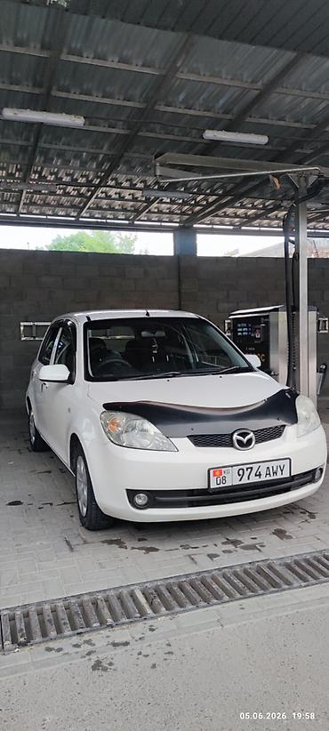 Mazda Demio: 2005 г., 1.5 л, Автомат, Бензин, Хэтчбэк