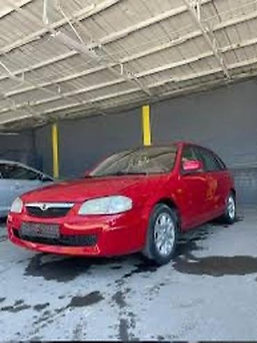 Mazda 323: 1998 г., 1.5 л, Механика, Бензин, Седан
