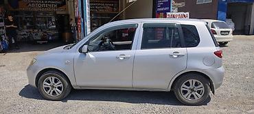 росрочка афто: Mazda Demio: 2003 г., Автомат, Бензин — 3