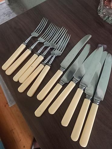 qab qaşıq: 12 ədəd paslanmayan vilka bıçaq desti. İstifade olunmayıb. 12 manat — 2