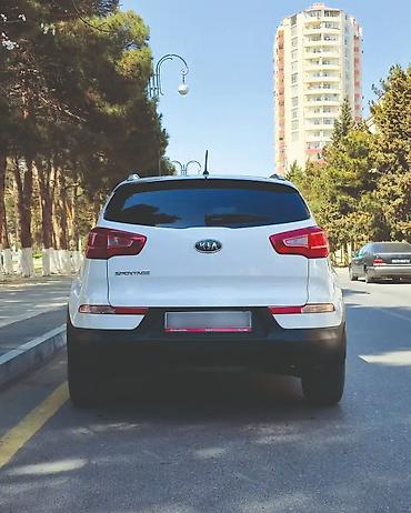 man sat: Kia Sportage: 2 l | 2011 il Ofrouder/SUV — 7