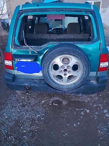 4 4: Mitsubishi Pajero iO: 1998 г., Бензин, Внедорожник — 3
