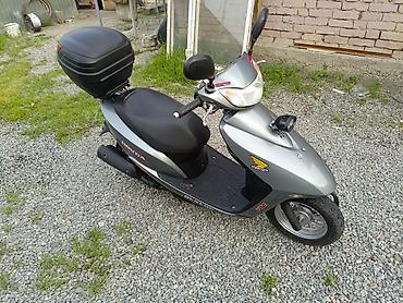 devo tiko: Скутер Honda (серия Dio) в серебристом цвете. Характеристики и — 3