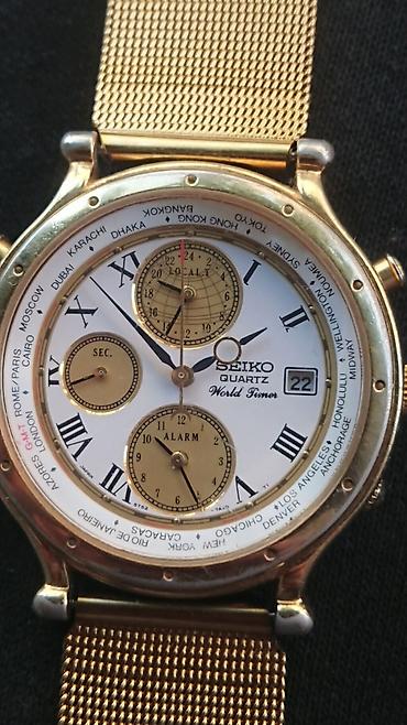 saat michael kors: Seiko Quartz World Timer qol saatı - Model: Seiko 5T52-7A19 (arxa — 1