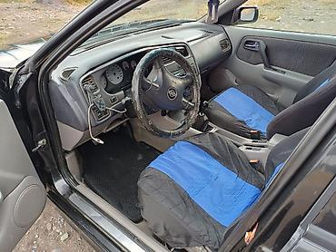 su 7: Nissan Primera: 2001 г., 1.8 л, Механика, Бензин, Седан — 6