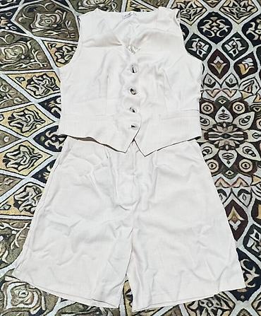 Пальто: Двубортное женское пальто ModaLARISSA из плотной твидовой ткани — 4