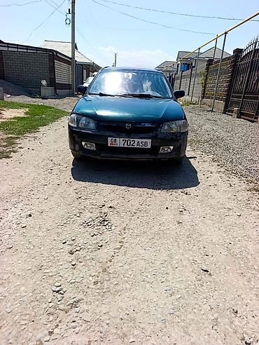 demio sport: Mazda 323: 2000 г., 1.6 л, Механика, Бензин, Лифтбек — 3