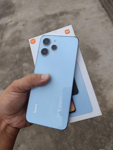 юан плюс: Redmi, Redmi 12, Б/у, 256 ГБ, цвет - Голубой, 2 SIM — 2