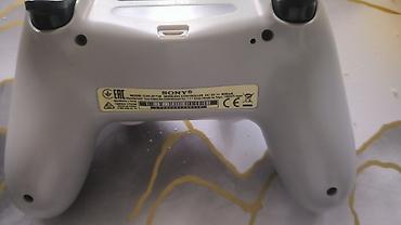 джойстики dualshock: Беспроводной геймпад Sony DualShock 4 (модель CUH-ZCT2E), цвет белый — 1