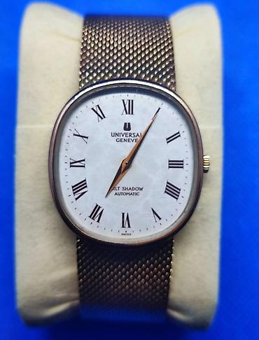 џепни сат: Universal Geneve Gilt Shadow Ellipse Cal. 2-66, iz 1970ih, izuzetno — 4