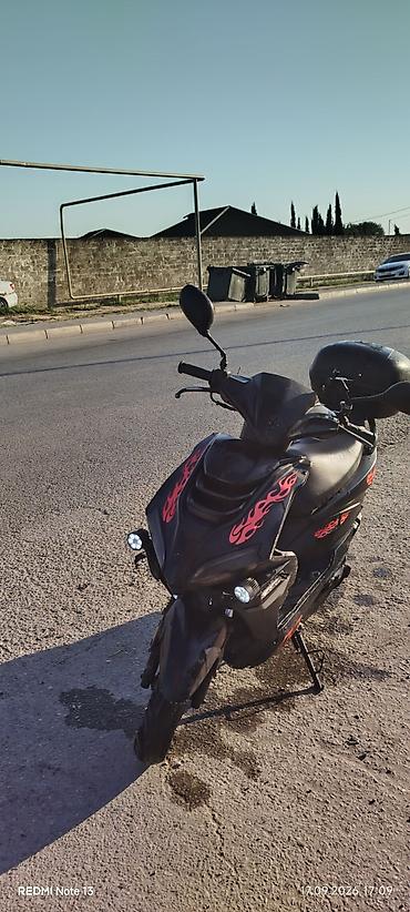 kasklar motor: Skuter – şəhər daxili yolçuluq üçün praktik və qənaətcil model — 1
