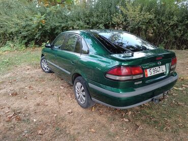 кызыл кыя машина базар: Mazda Capella: 1998 г., 1.8 л, Механика, Бензин, Хэтчбэк