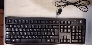 Logitech K120 USB US tastaturapolovna ispravna,manja ostecenja od