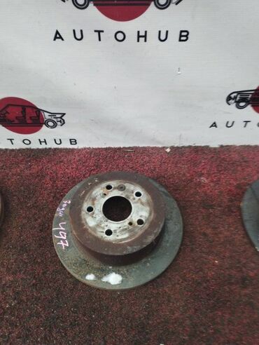 Другие автозапчасти: Тормозной диск Toyota Ipsum ACM21W 2AZ-FE 2003 задн. (б/у) ХОДОВАЯ