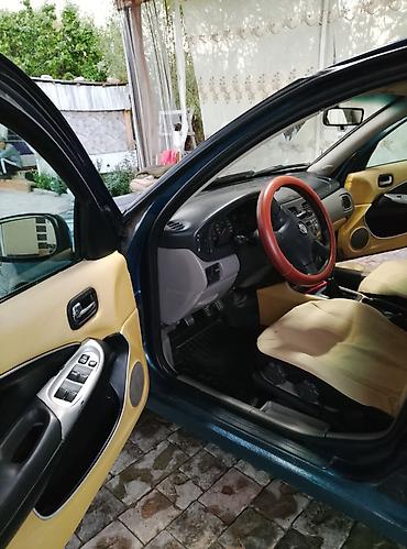 водный катер: Nissan Almera: 2001 г., Механика, Хэтчбэк — 9