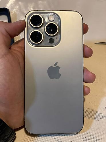 iphone 13 dubayski: IPhone 15 Pro, 128 GB, Gümüşü, Simsiz şarj — 1